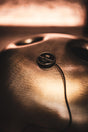 MEINL Sonic Energy SEPU pickup in black – portrait application view on a handpan