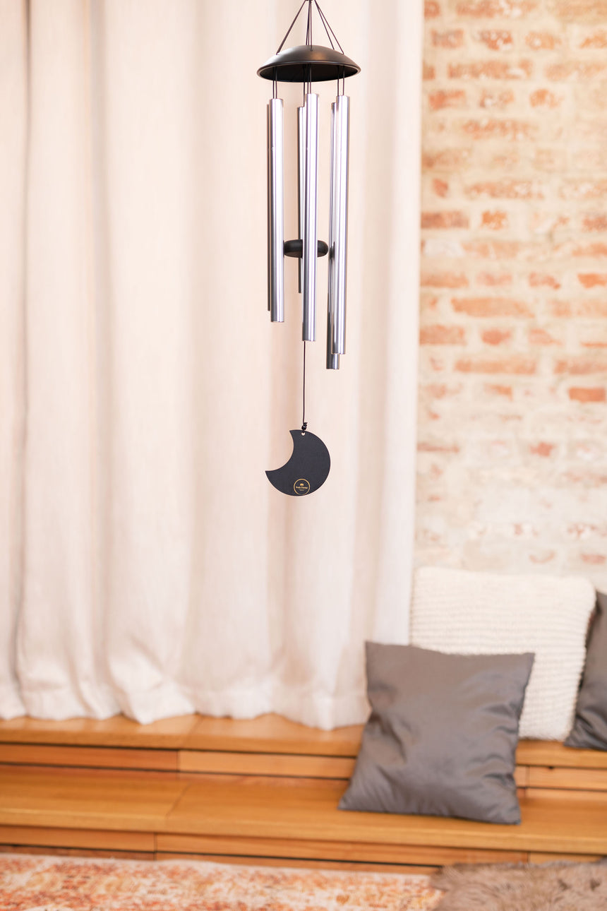 Silver Meinl Sonic Energy MMC32S Moon Meditation Chime, 32 inches – hanging in a room