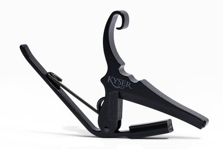 Kyser KG6LTA Low-Tension-Kapodaster für Stahlsaitengitarre, schwarz – Vorderansicht auf weißem Hintergrund.