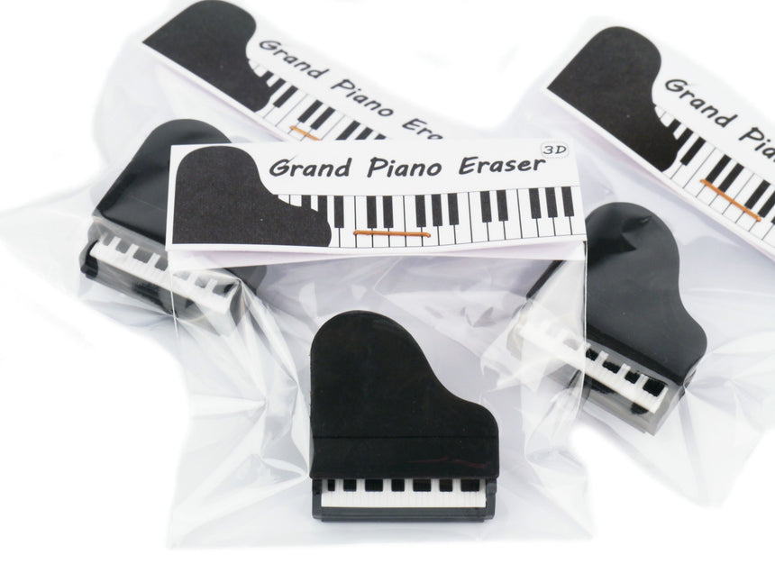 Gomme Agifty E 1041 en forme de piano à queue noir : plusieurs exemplaires emballés individuellement